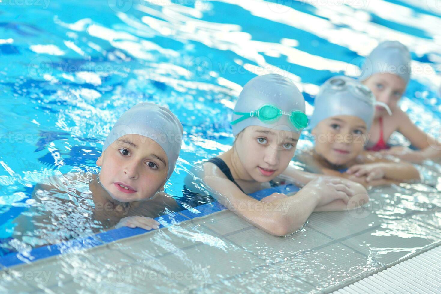 children group  at swimming pool photo