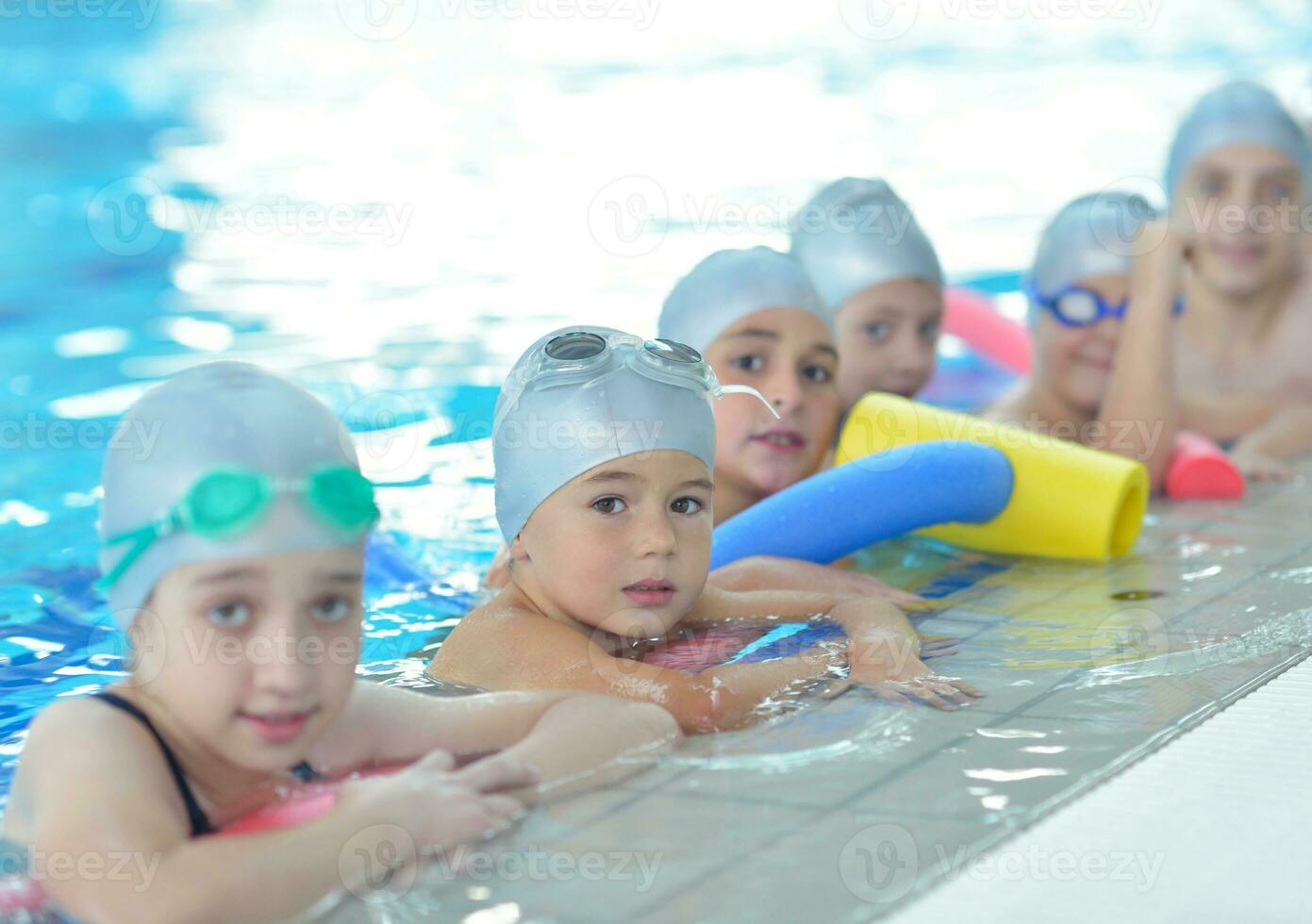 children group  at swimming pool photo