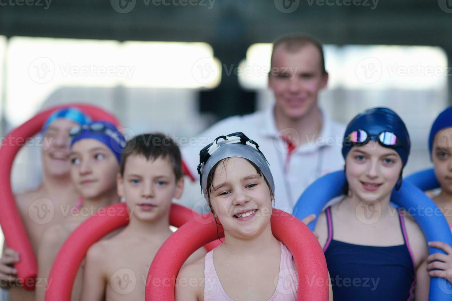 happy children group  at swimming pool photo