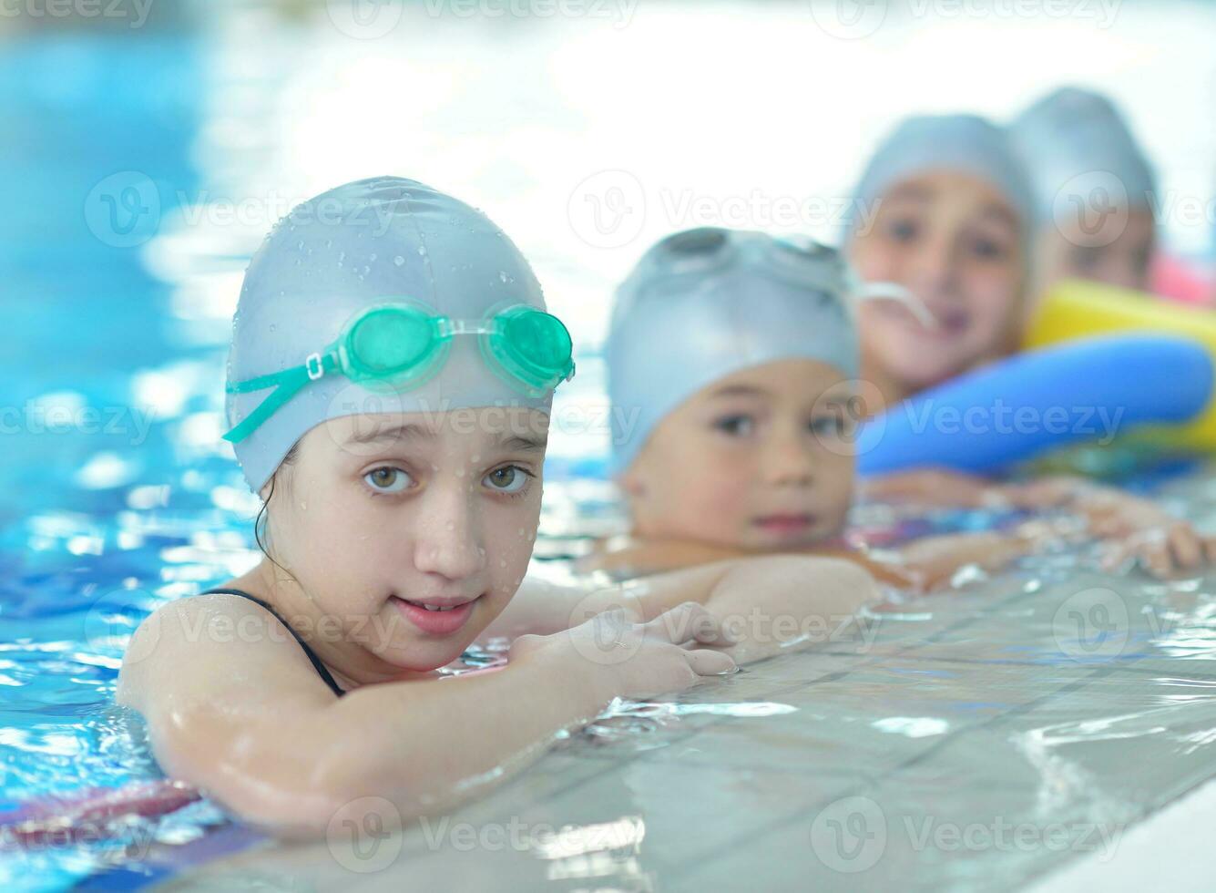 children group  at swimming pool photo