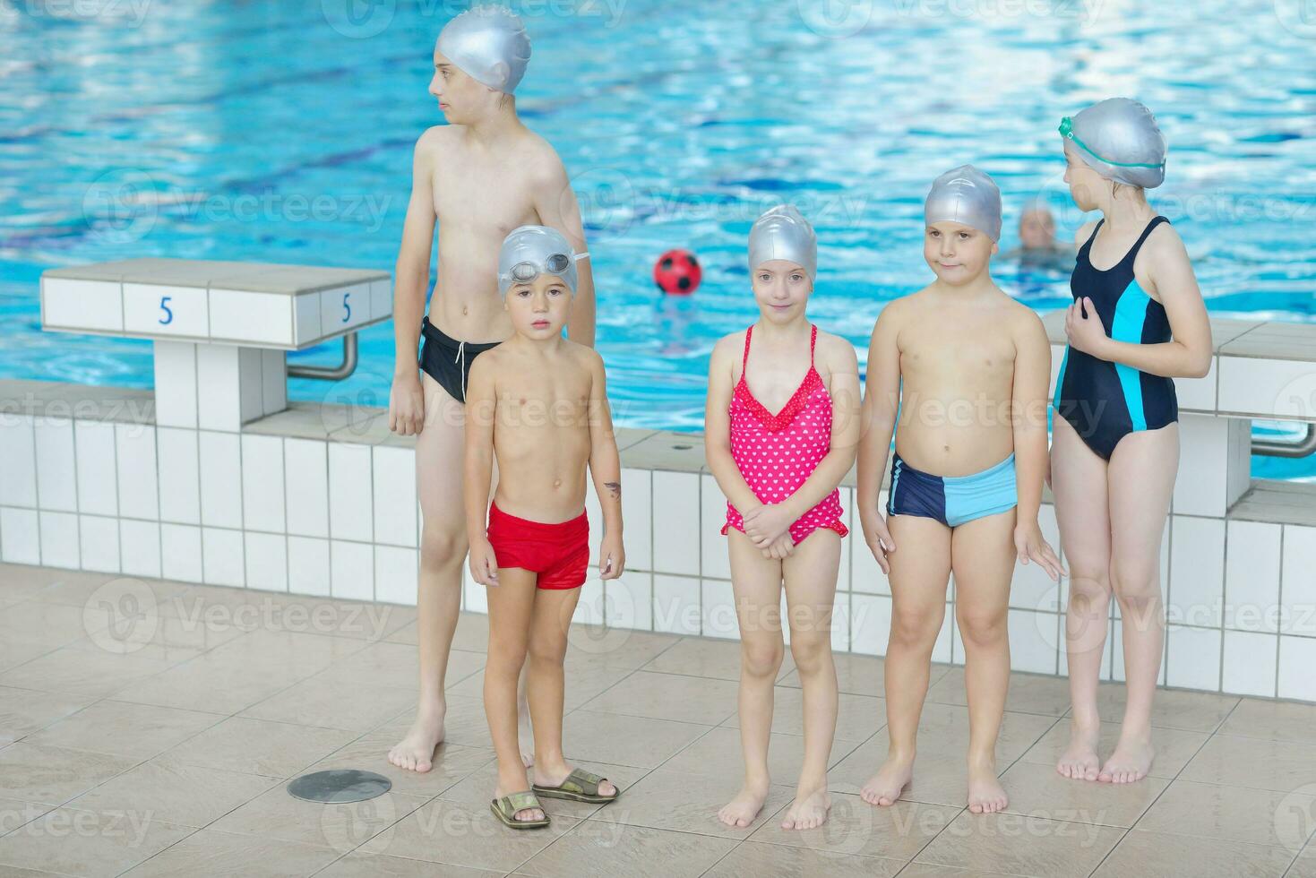 children group  at swimming pool photo