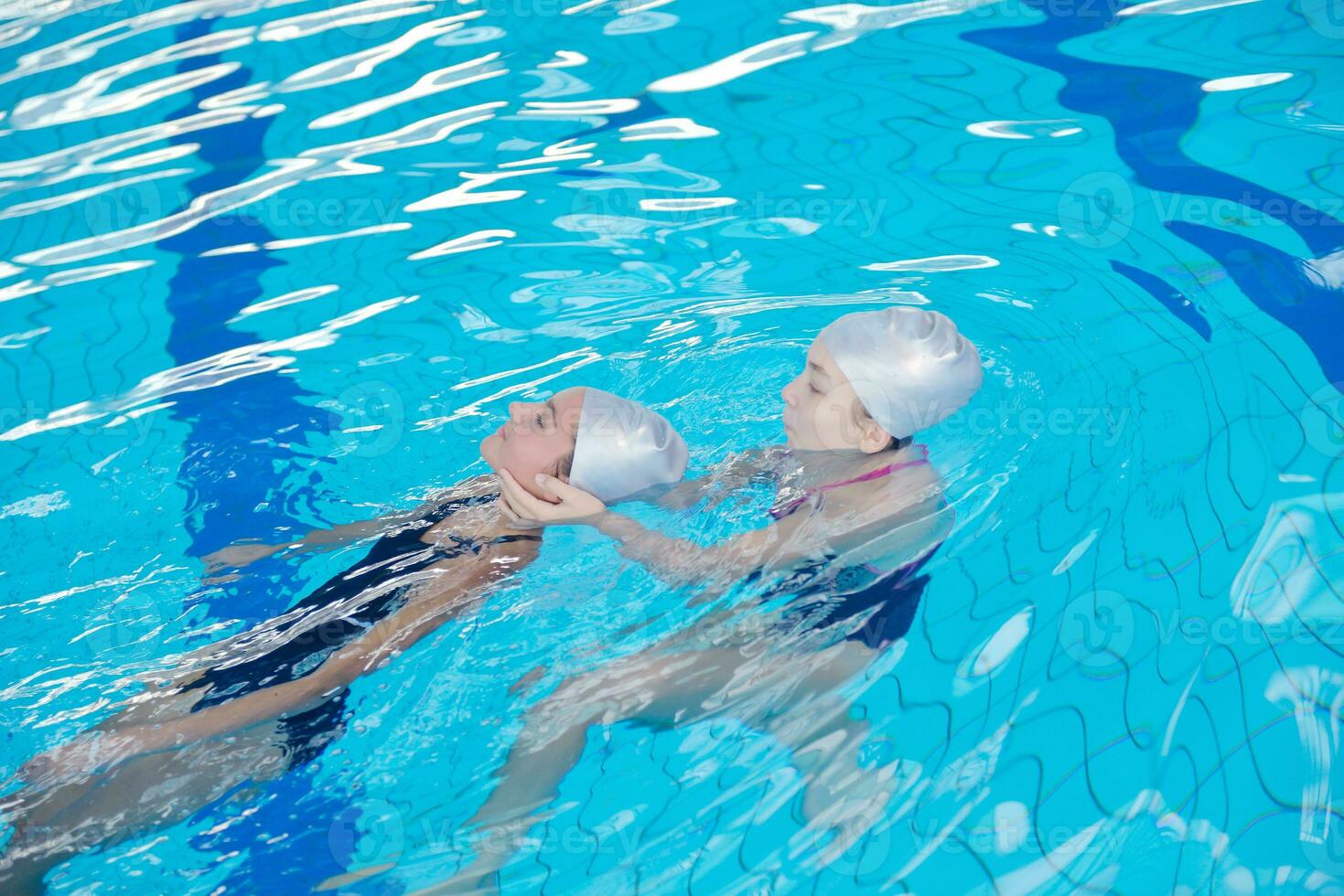 help and rescue on swimming pool photo