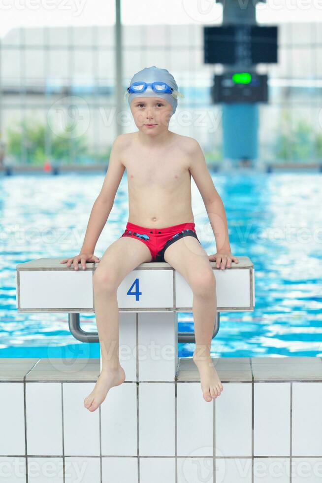 child portrait on swimming pool photo