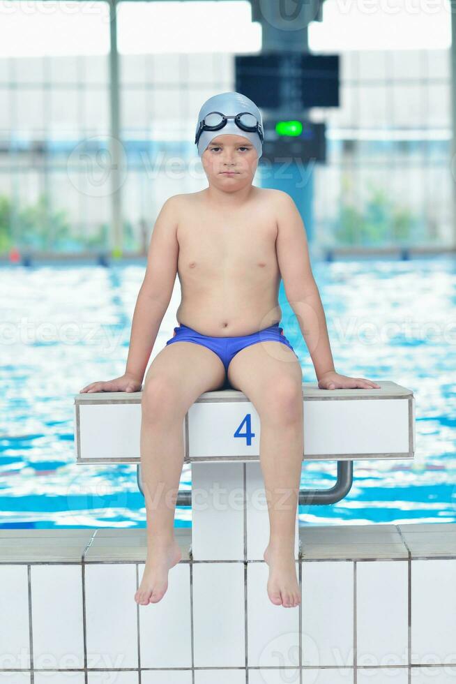 child portrait on swimming pool photo