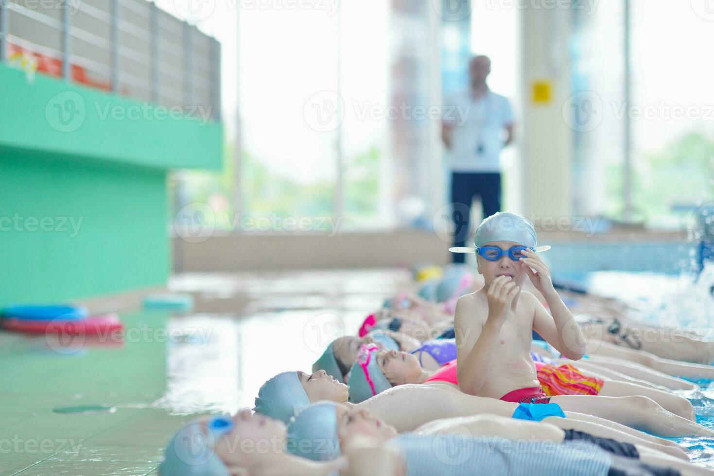 children group  at swimming pool photo
