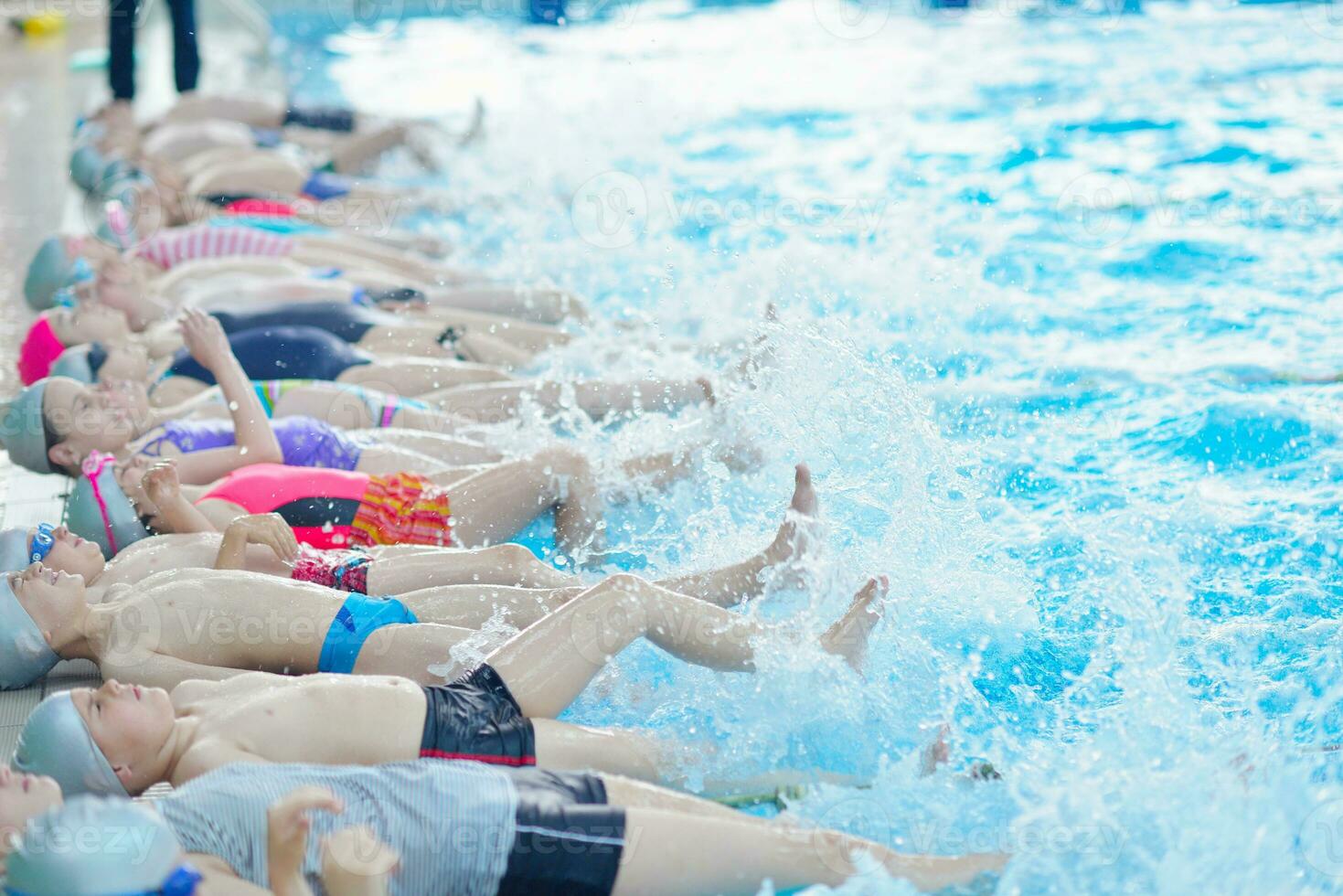 children group  at swimming pool photo