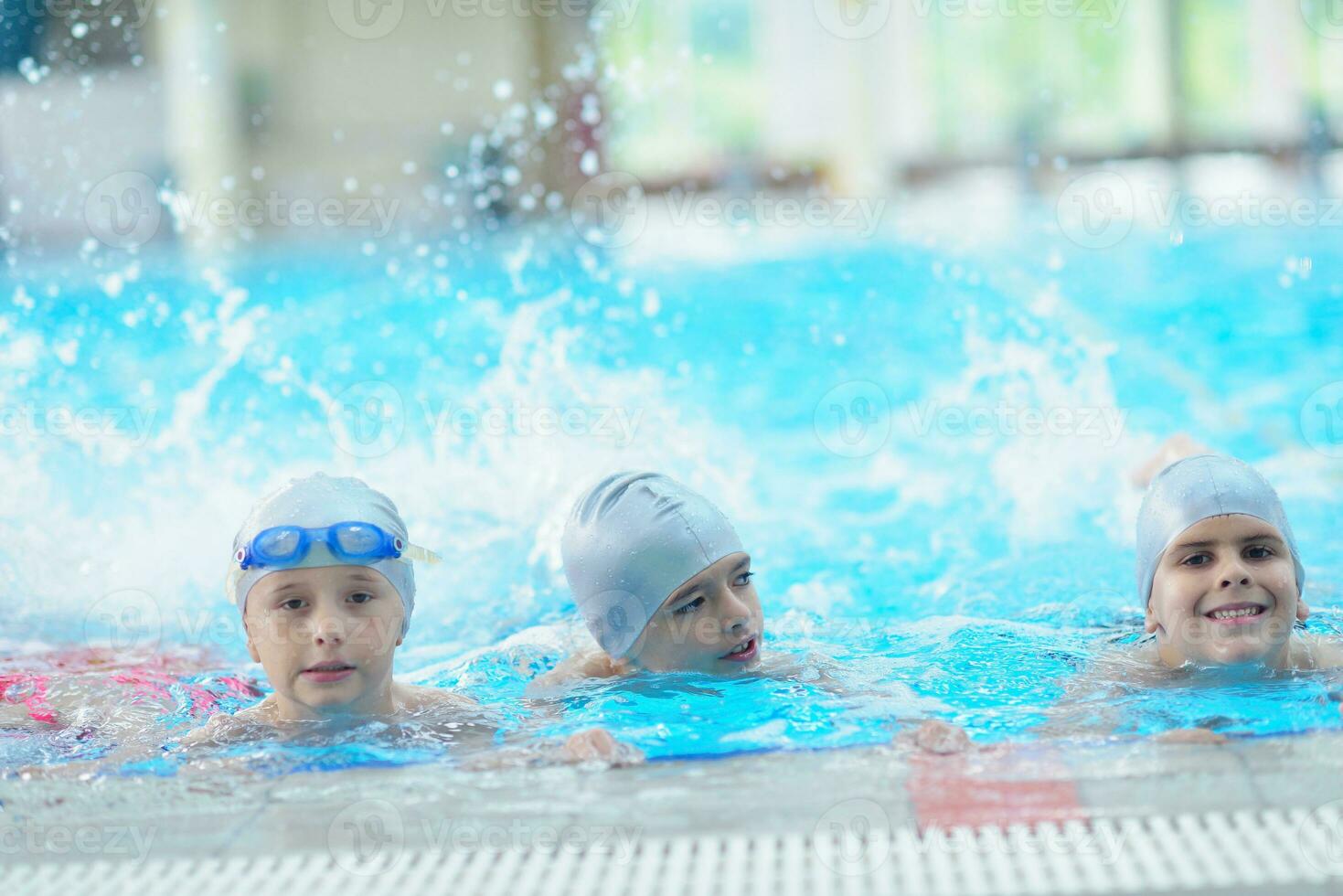 children group  at swimming pool photo