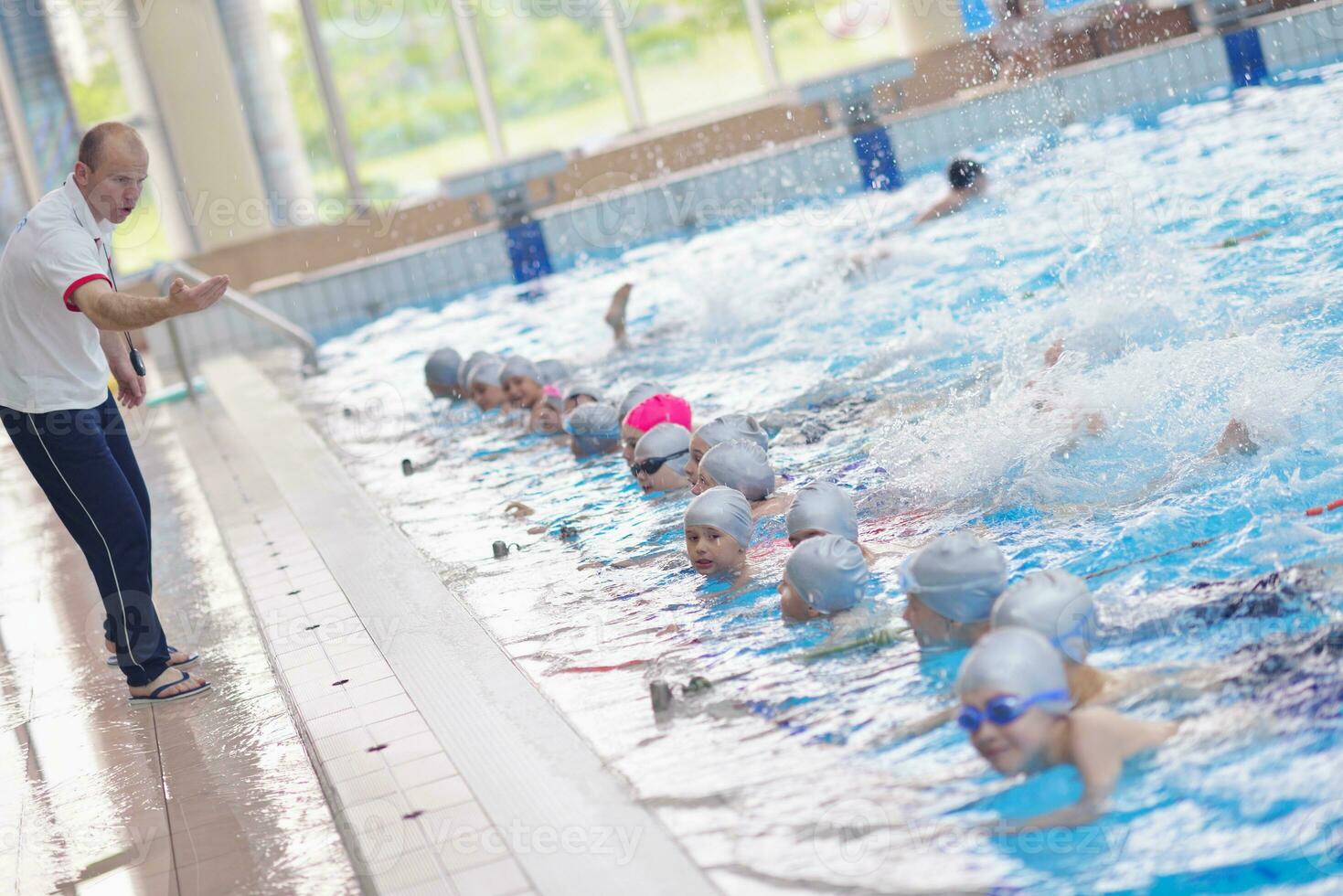 children group  at swimming pool photo