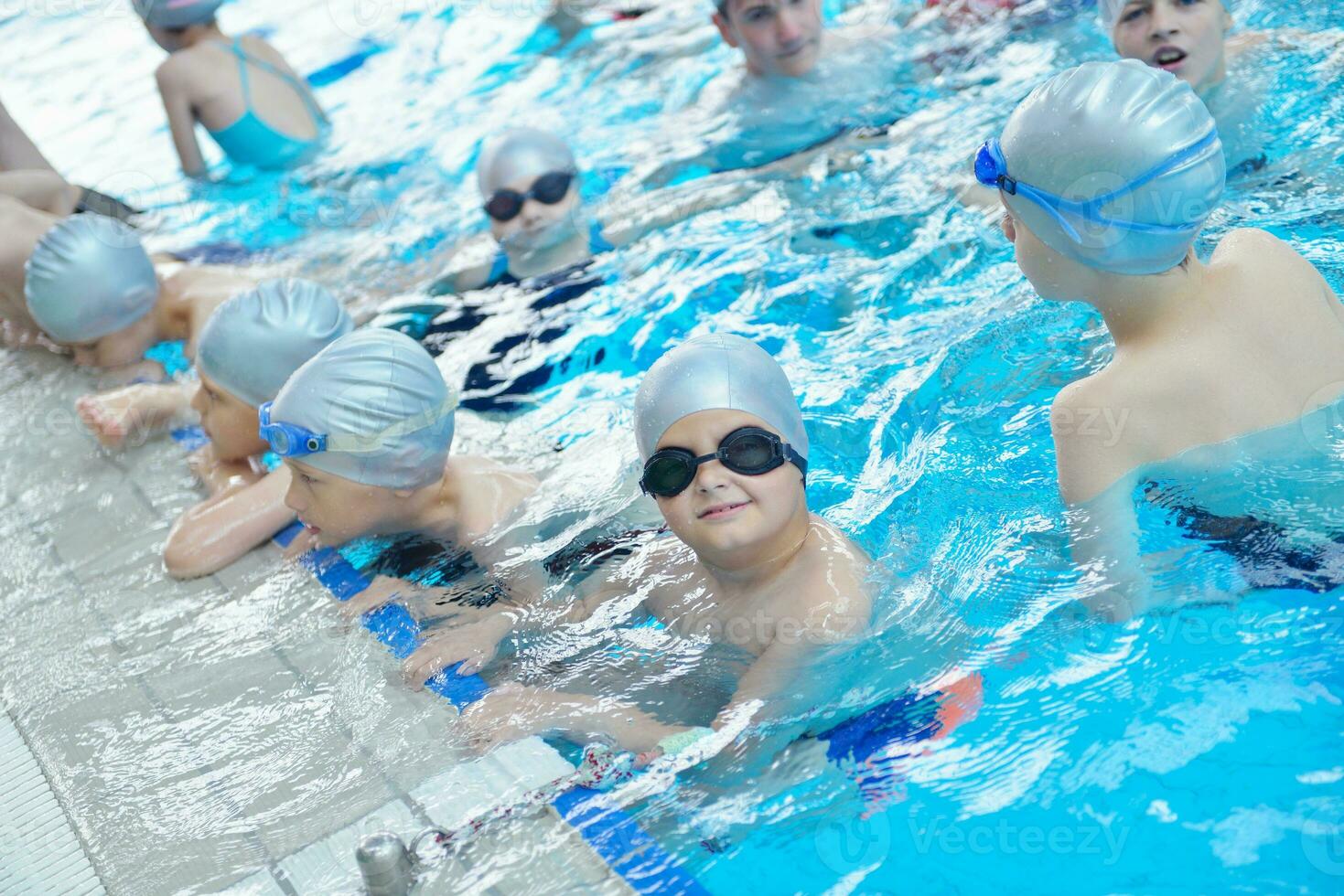 children group  at swimming pool photo