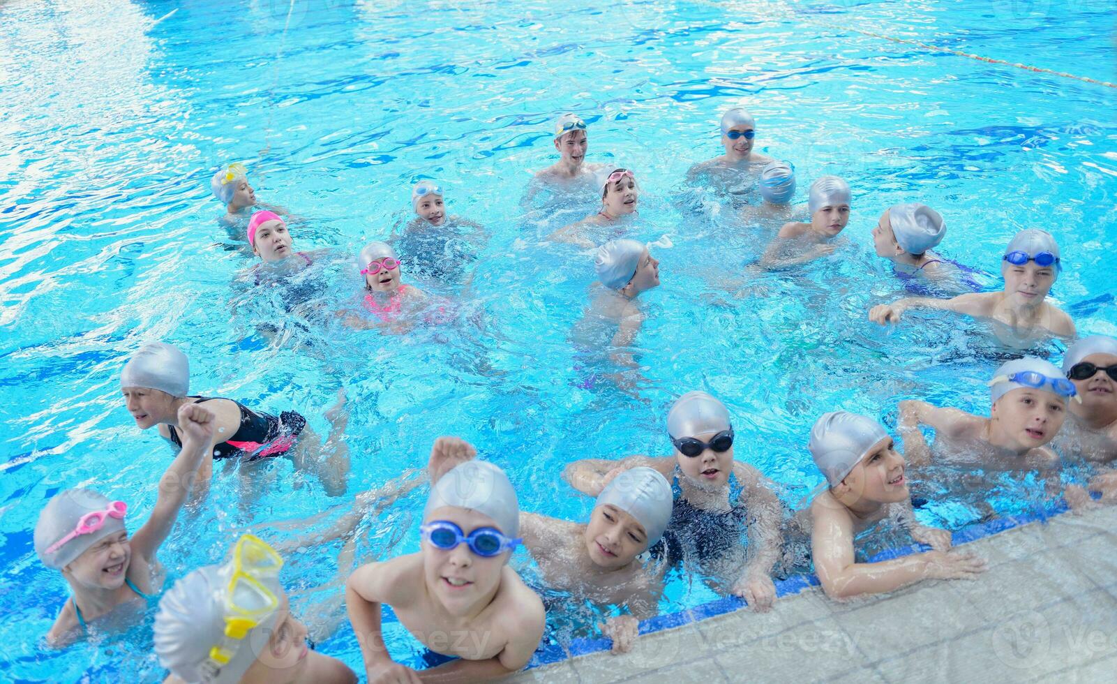 children group  at swimming pool photo