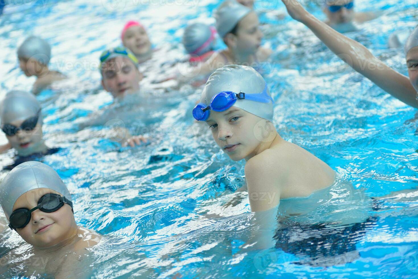 children group  at swimming pool photo