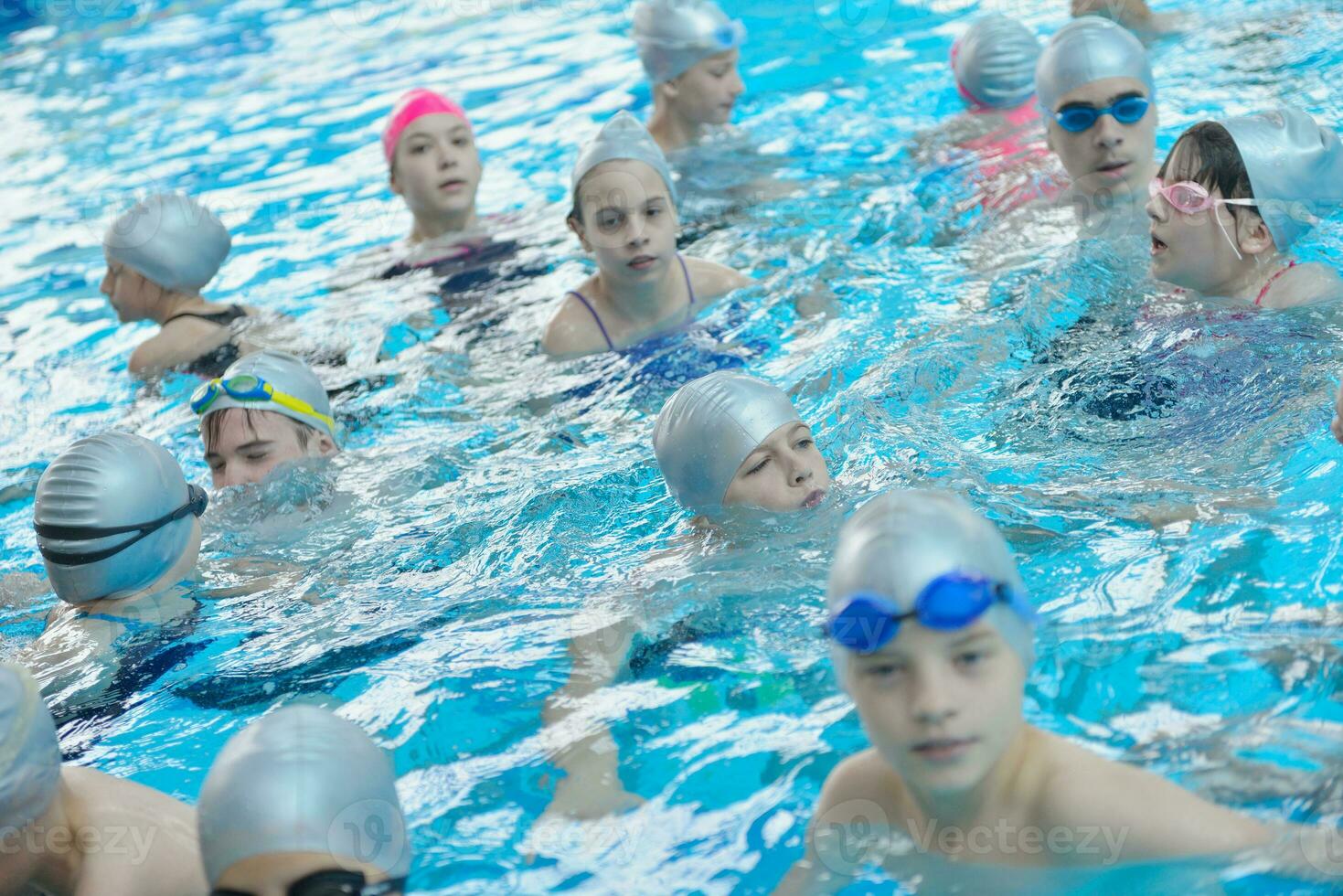 children group  at swimming pool photo