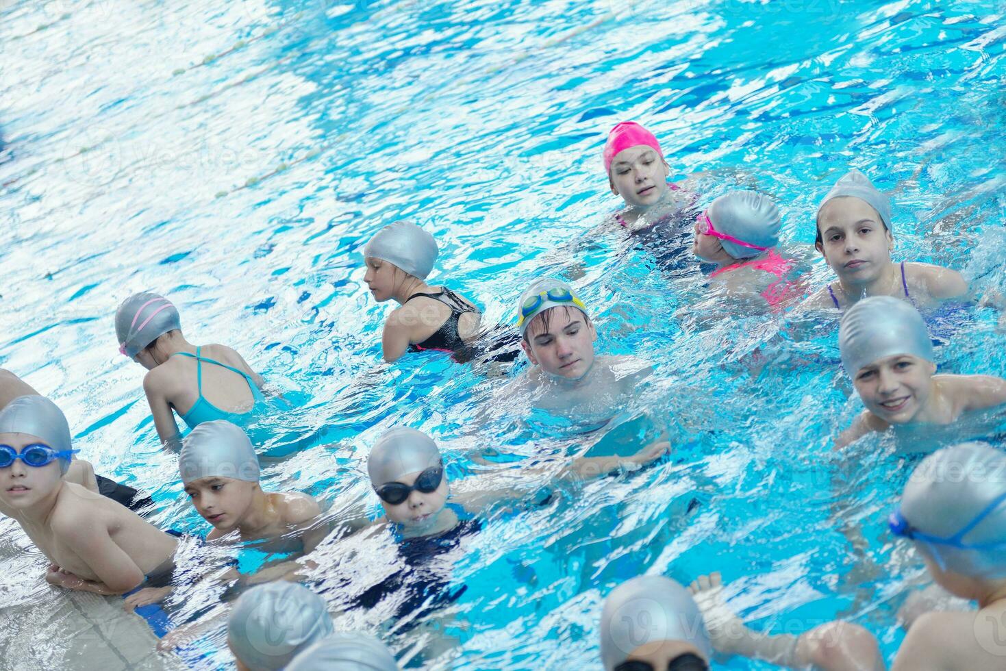 children group  at swimming pool photo