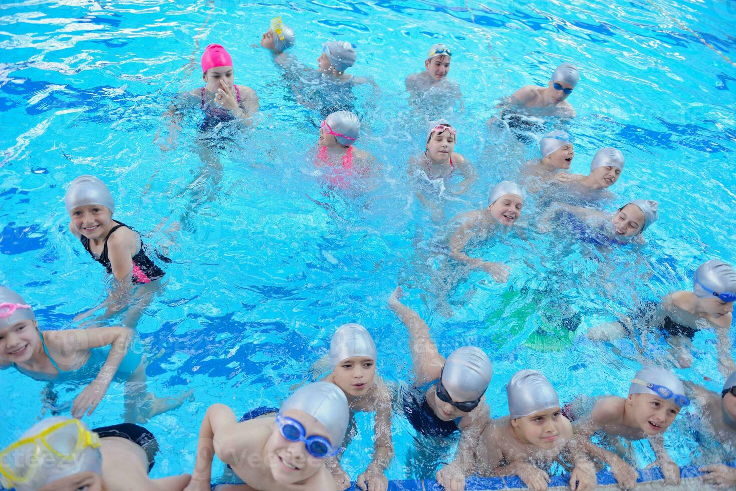 children group  at swimming pool photo