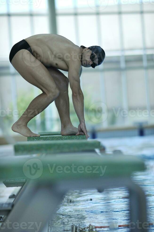 young swimmer ready for start photo