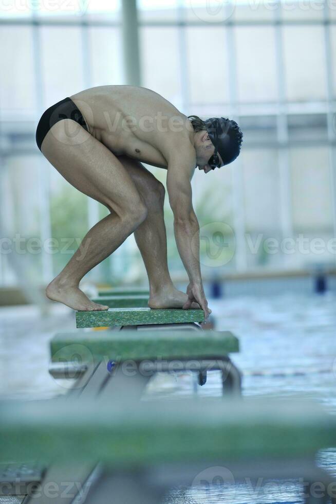 young swimmer ready for start photo