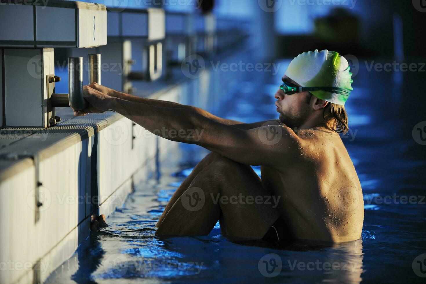 young swimmmer on swimming start photo