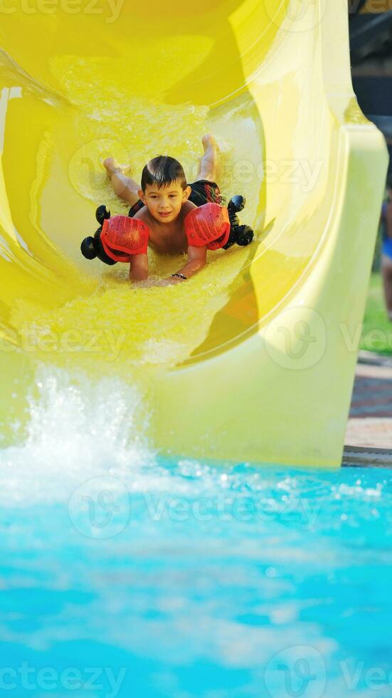 water slide fun on outdoor pool photo