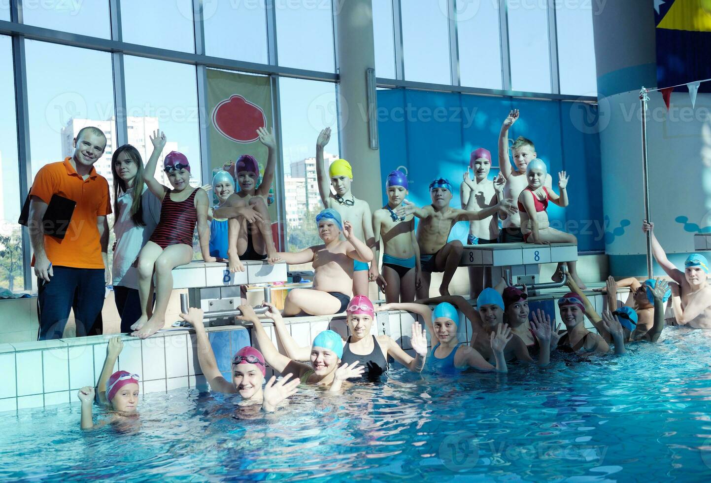 happy children group  at swimming pool photo