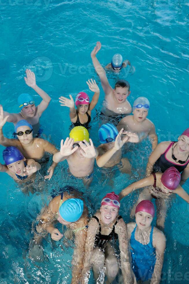 happy children group  at swimming pool photo