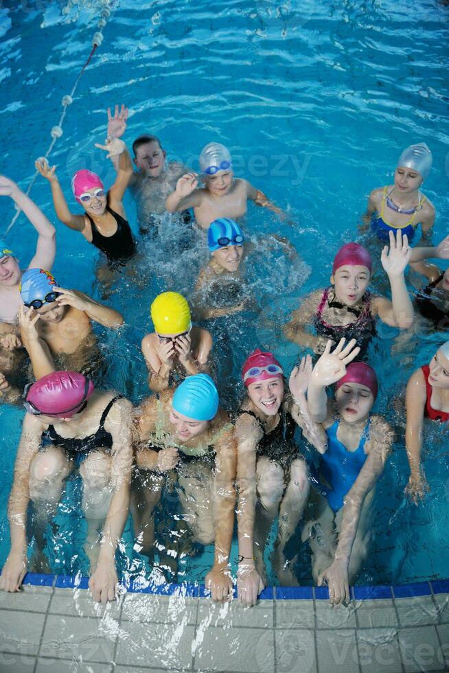 happy childrens at swimming pool photo