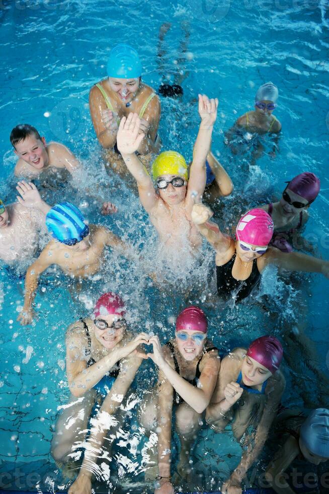 happy childrens at swimming pool photo