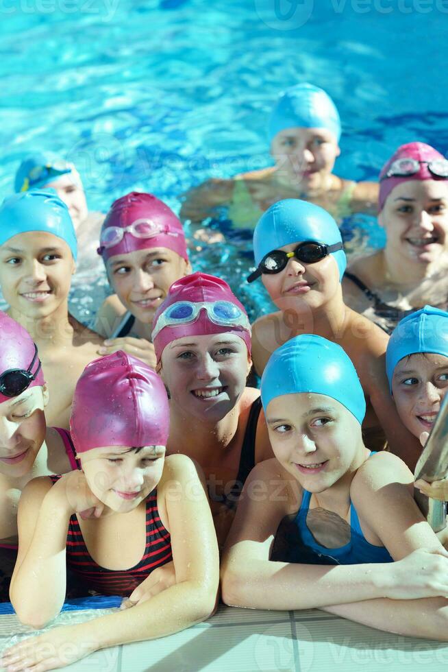 happy children group  at swimming pool photo