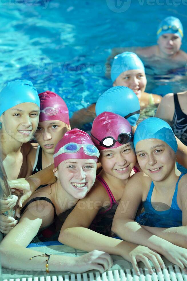 happy children group  at swimming pool photo