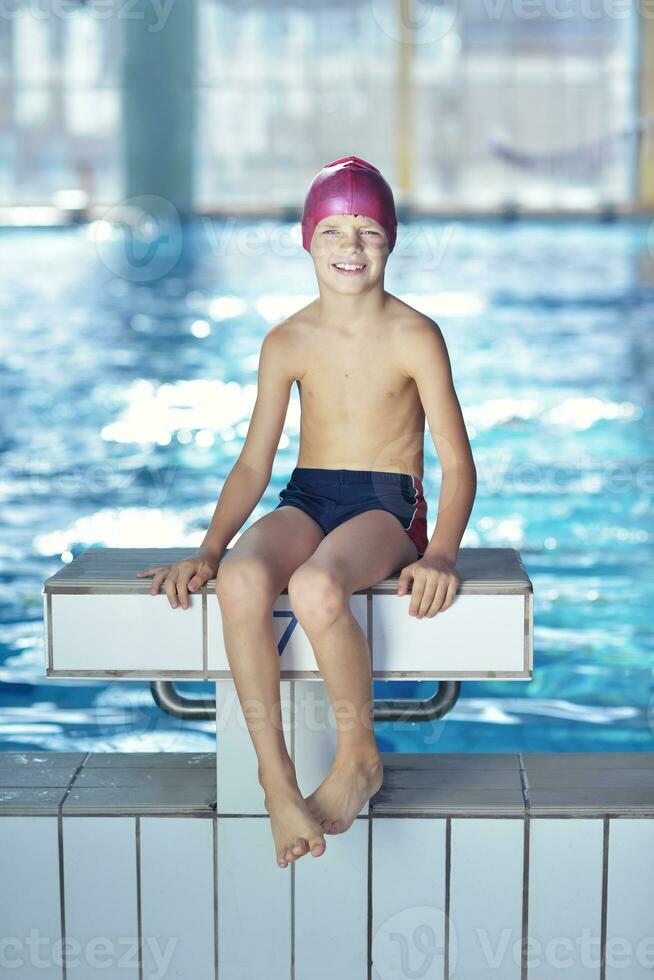 happy child on swimming pool photo