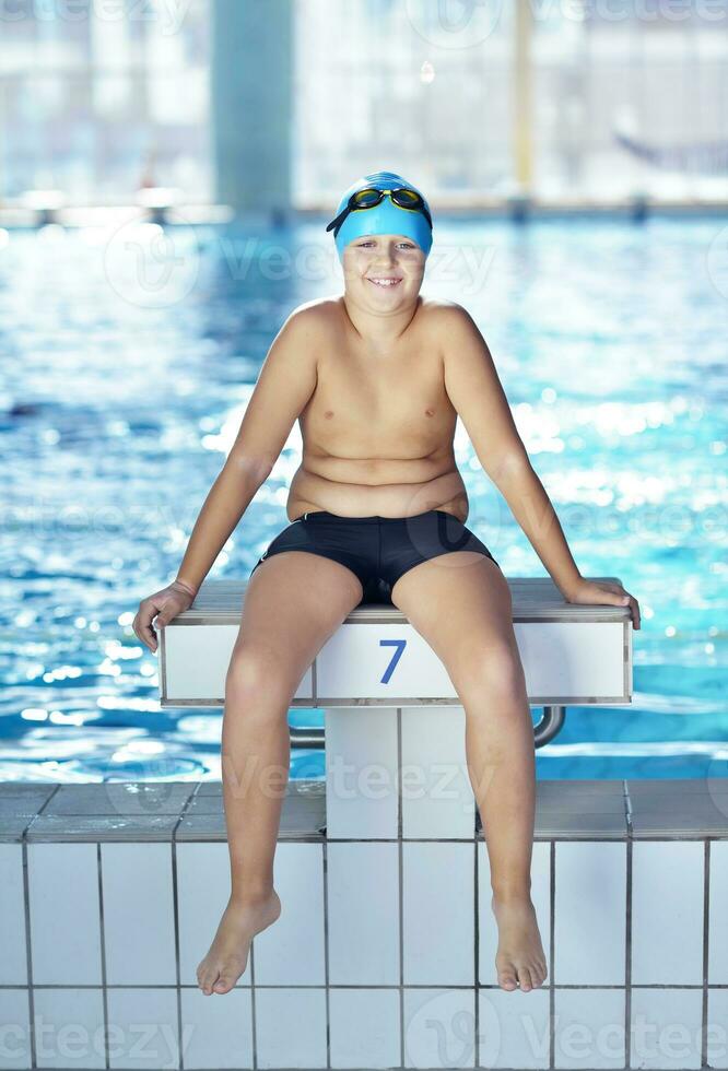 happy child on swimming pool photo