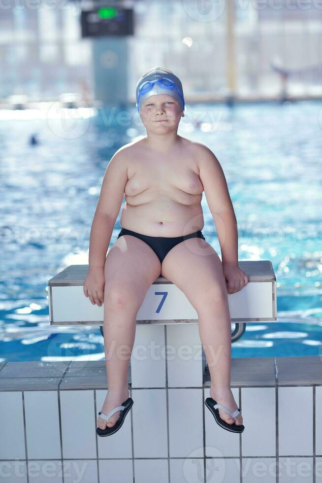 happy child on swimming pool photo