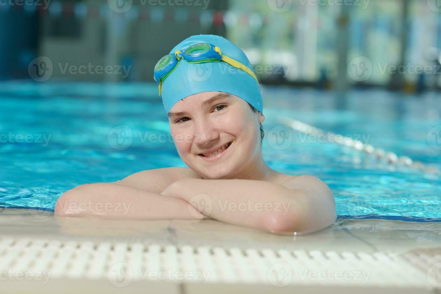 happy child on swimming pool photo