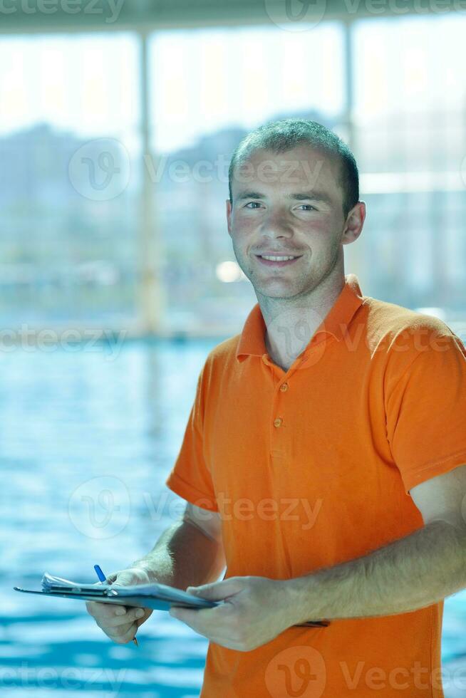 happy child group  at swimming pool photo