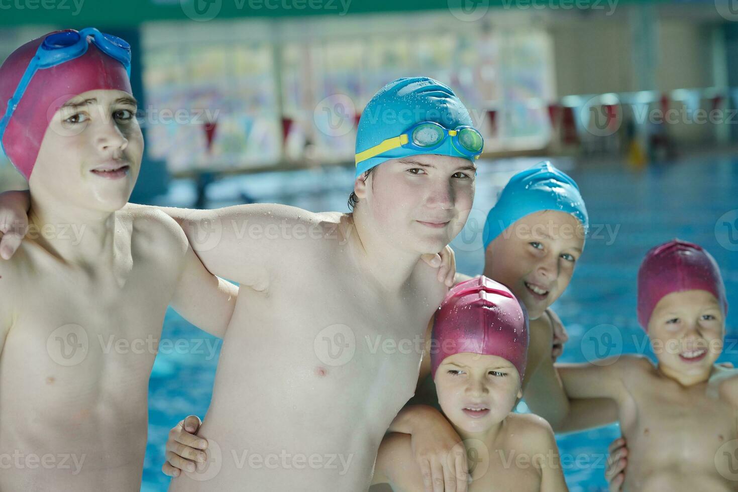 happy childrens at swimming pool photo