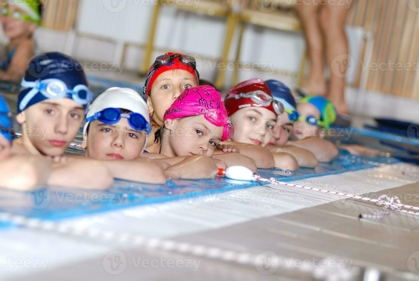 .childrens in serie at swimming pool photo