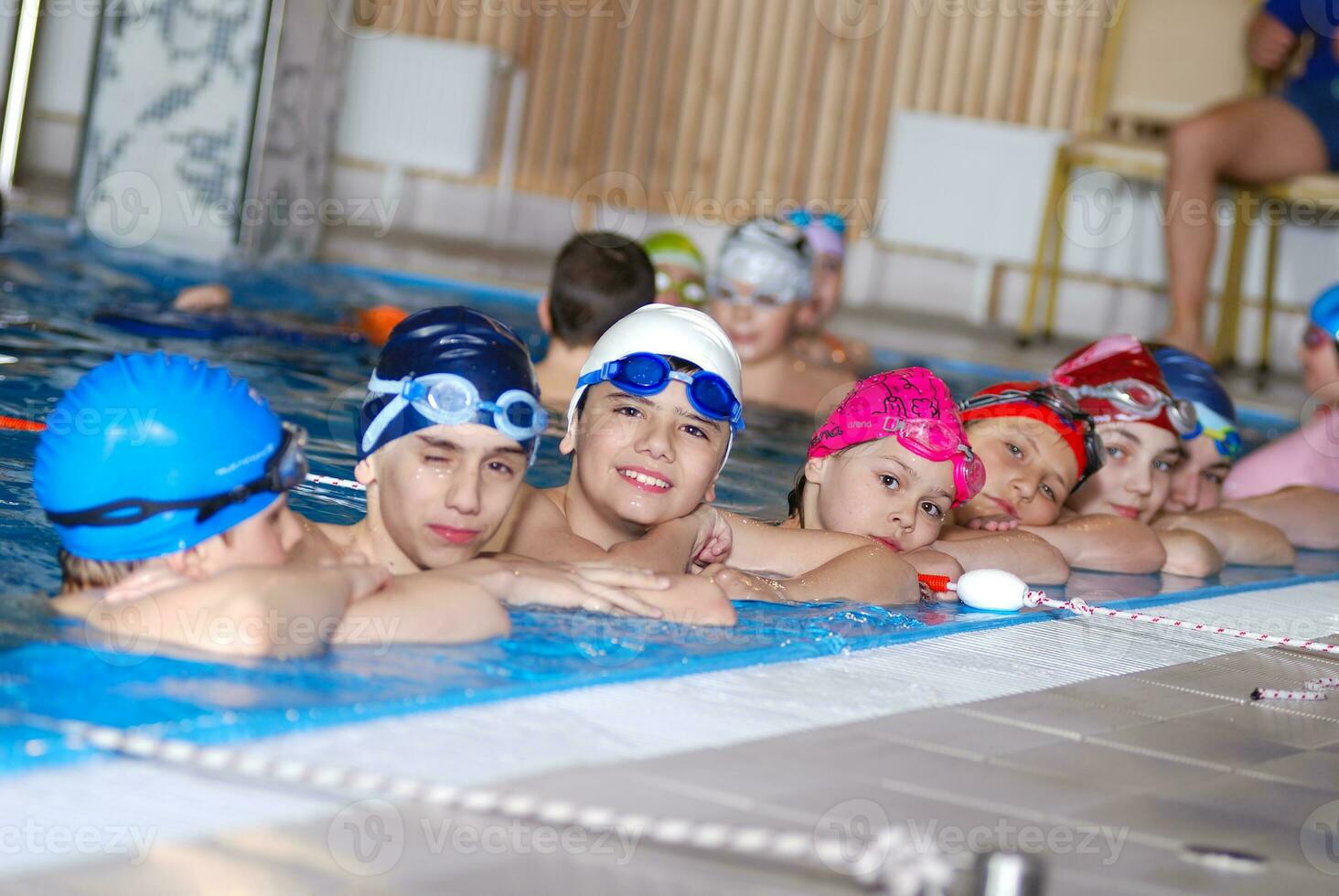 .childrens in serie at swimming pool photo