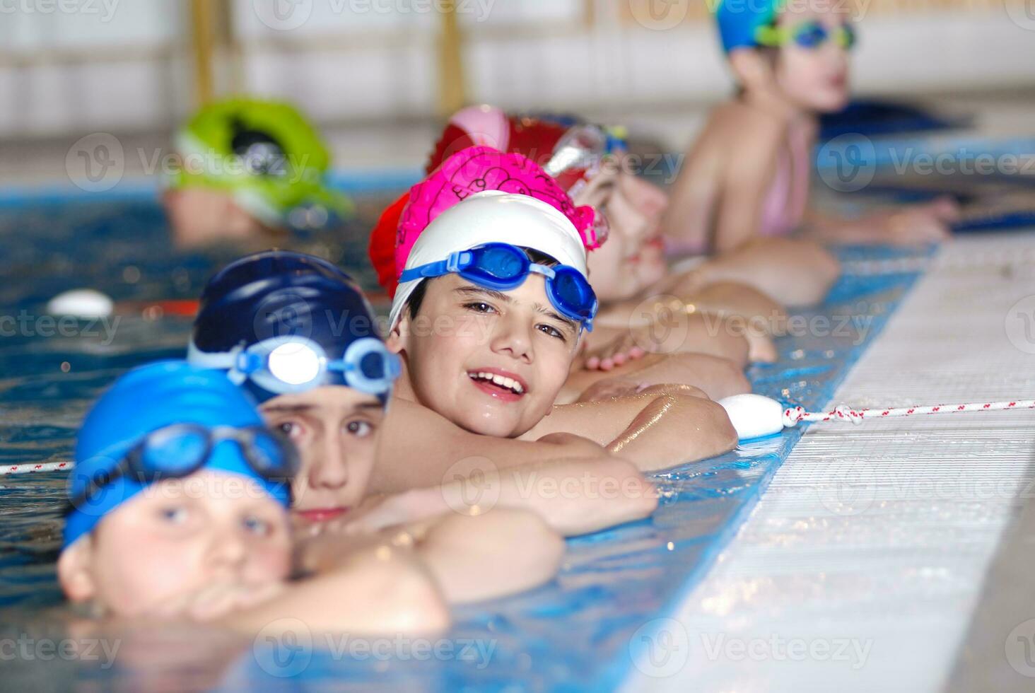 .childrens in serie at swimming pool photo