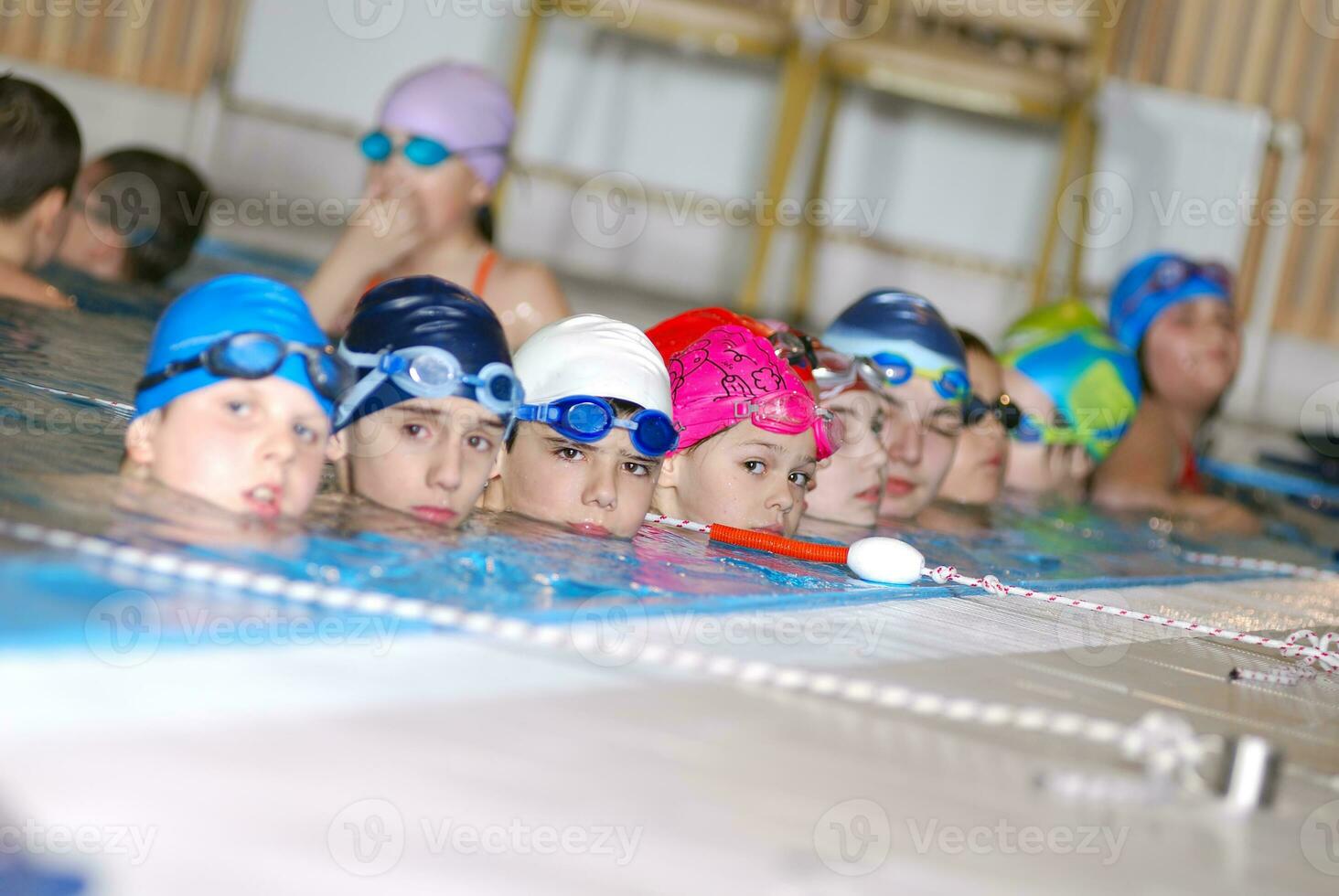 .childrens in serie at swimming pool photo