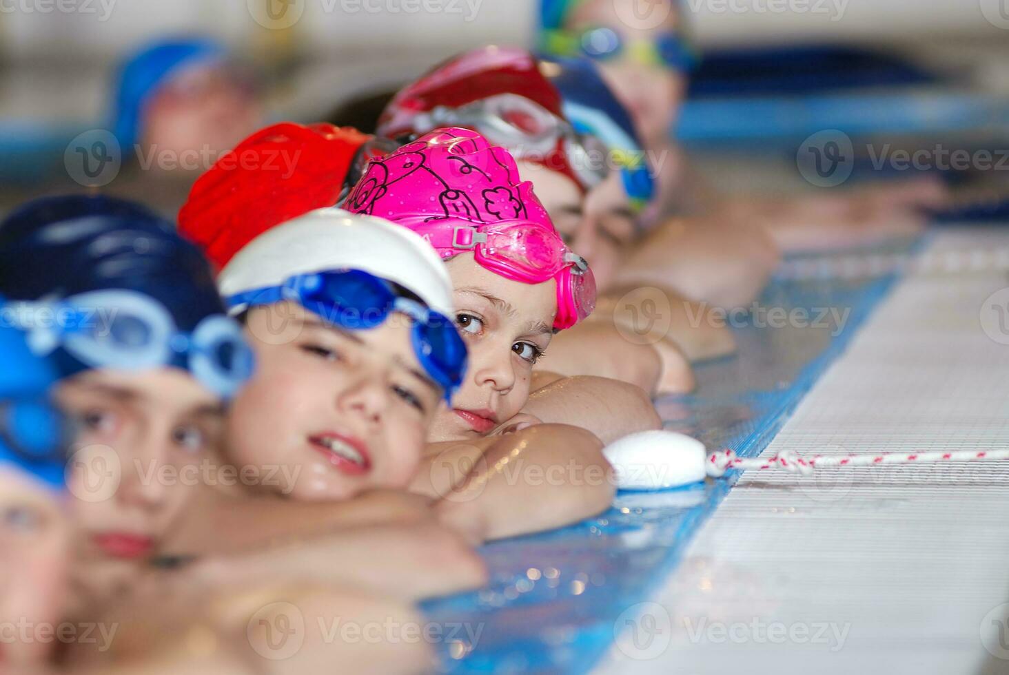 .childrens in serie at swimming pool photo