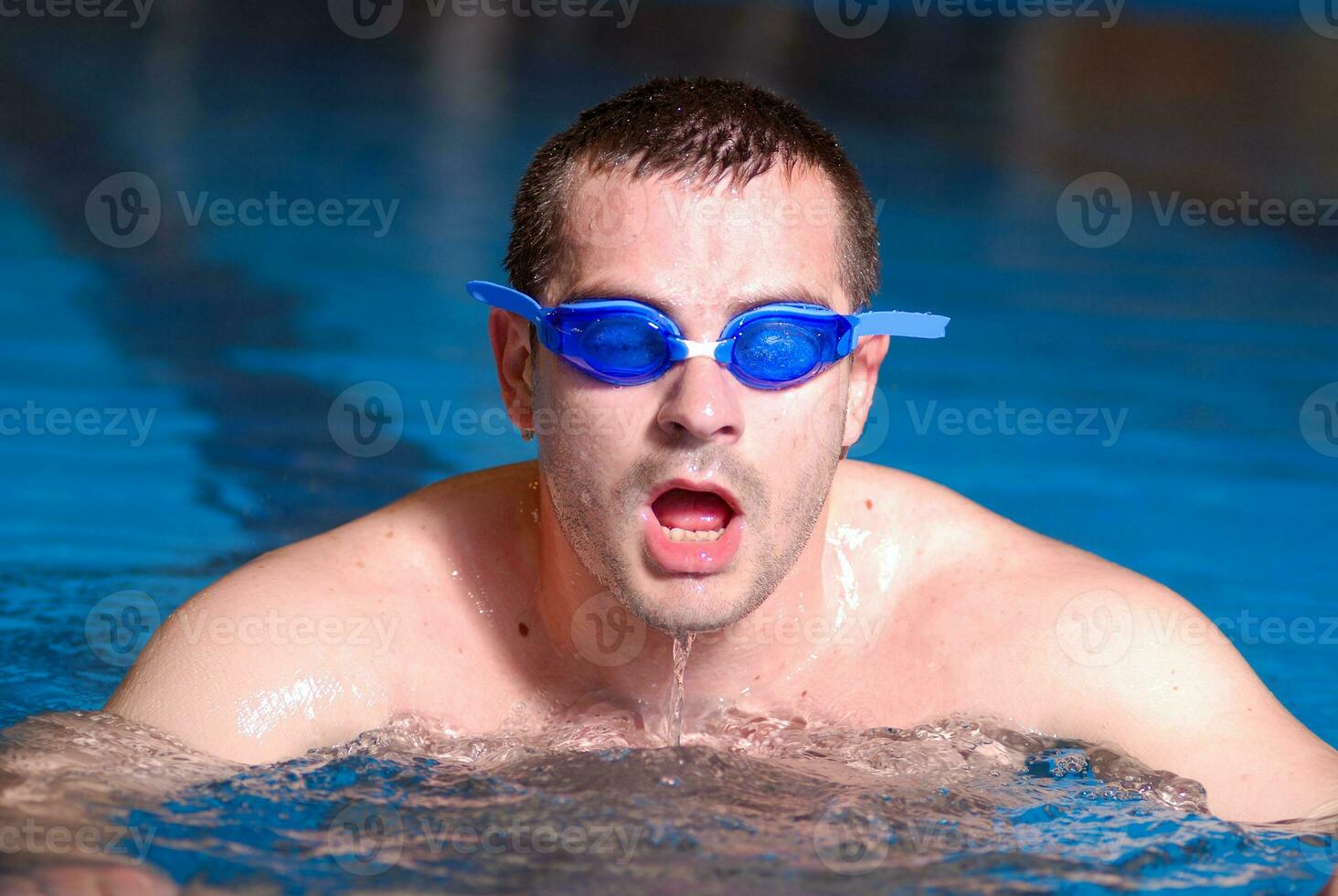 .man in swimming pool photo