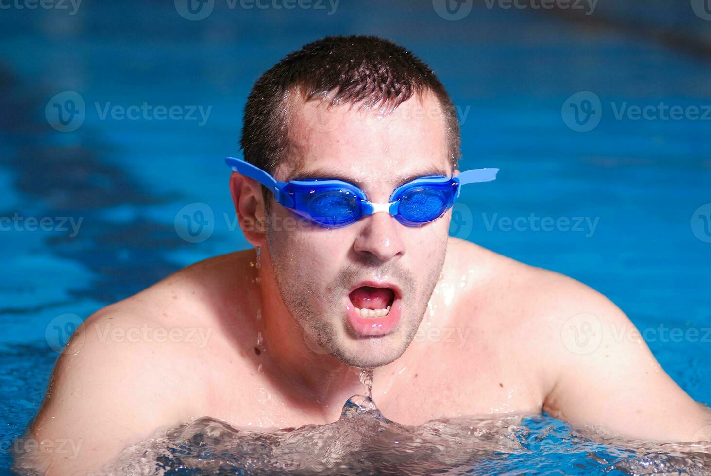 .man in swimming pool photo