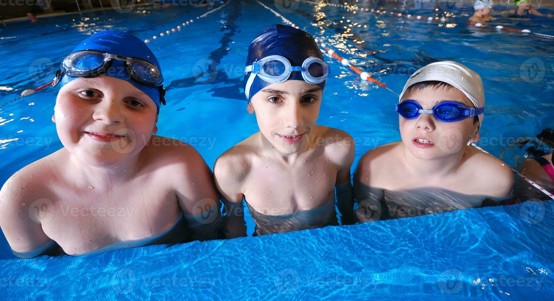 .childrens in serie at swimming pool photo