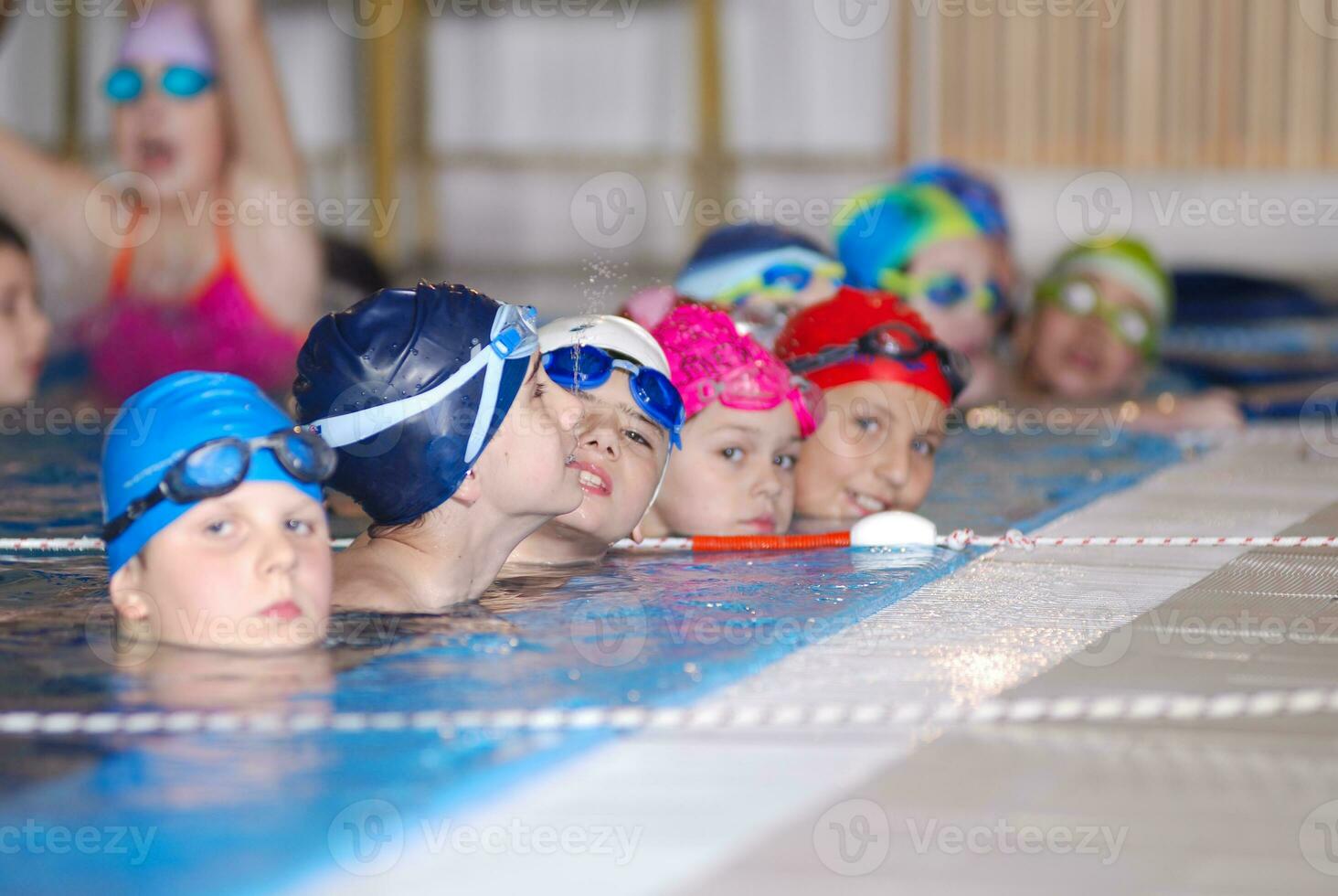 .childrens in serie at swimming pool photo