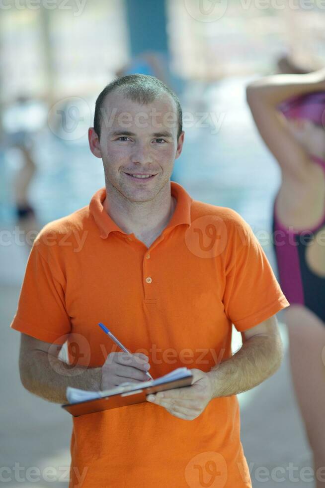 happy childrens at swimming pool photo