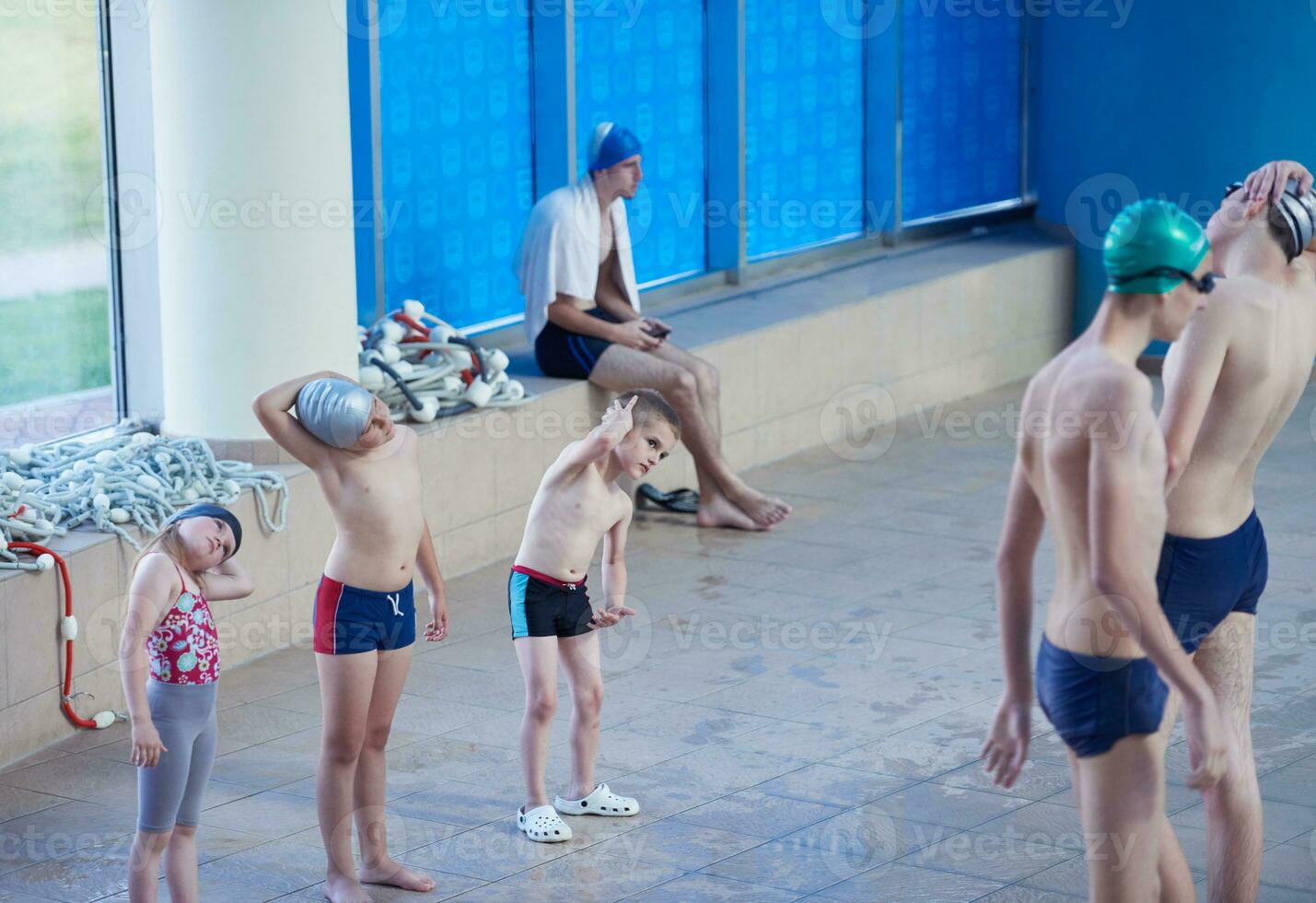 child group  at swimming pool school class photo