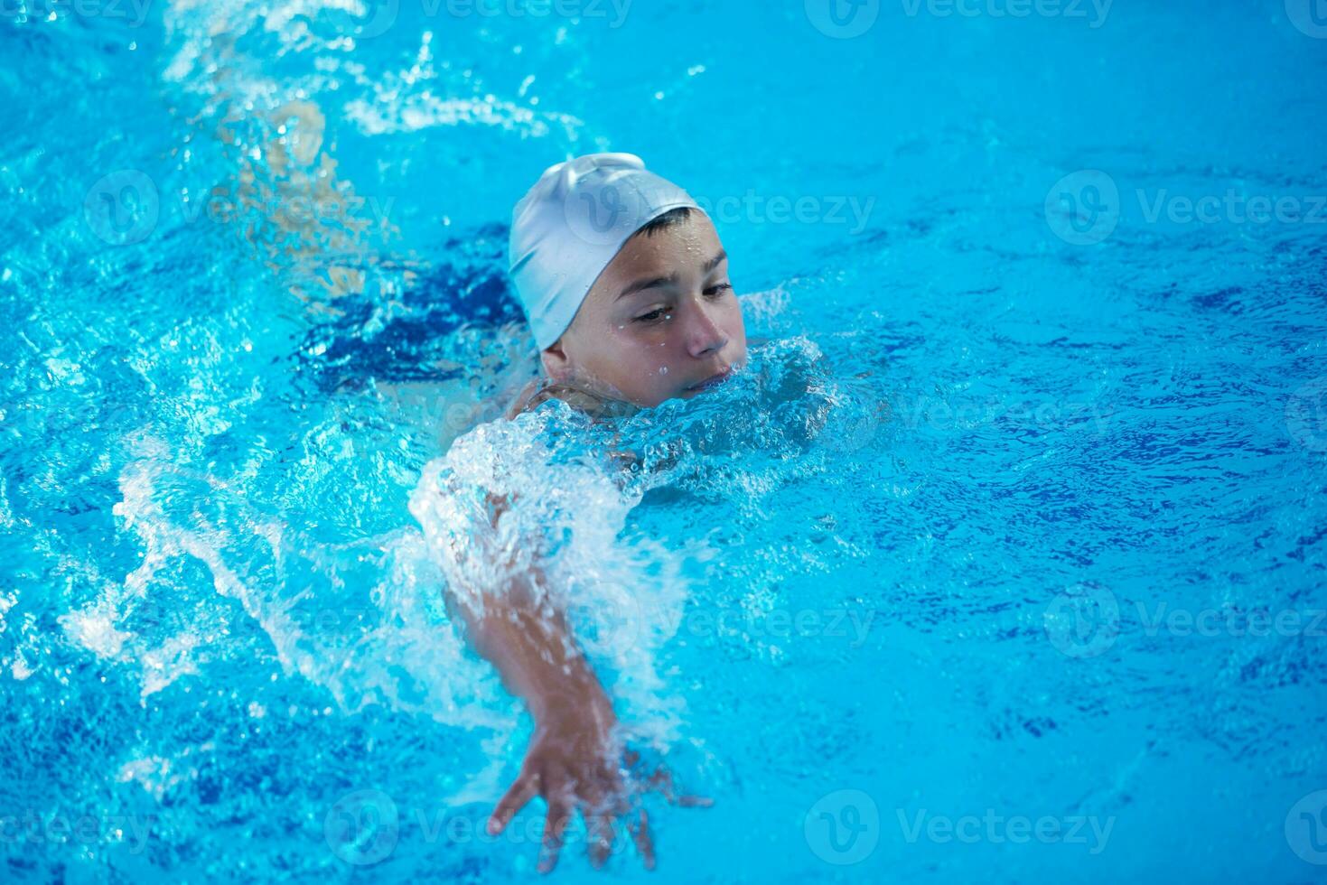 child on swimming poo photo