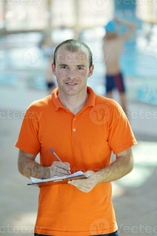 happy children group  at swimming pool photo