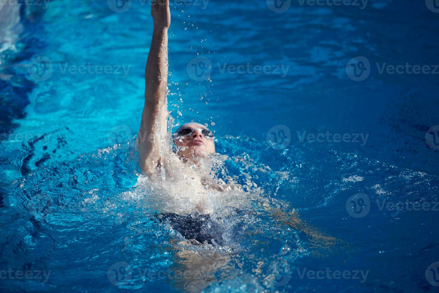 swimmer excercise on indoor swimming poo photo