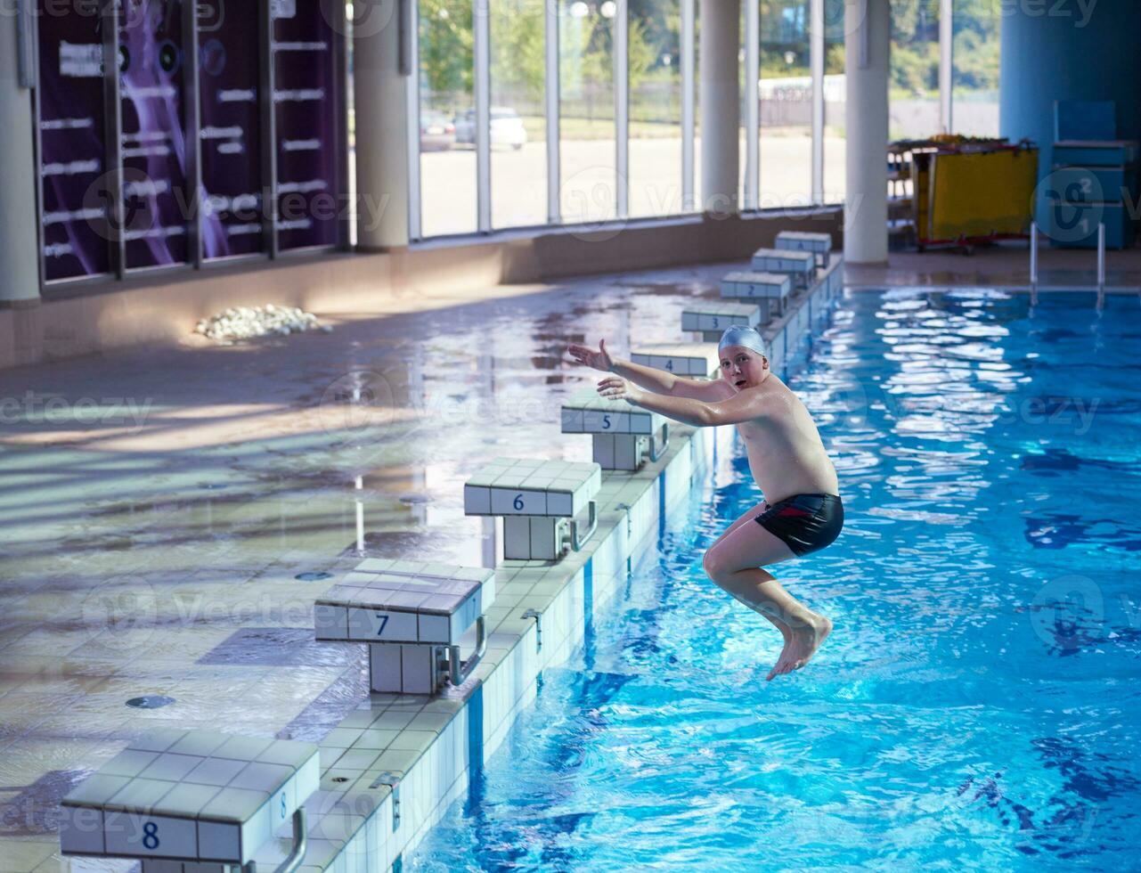 child on swimming poo photo