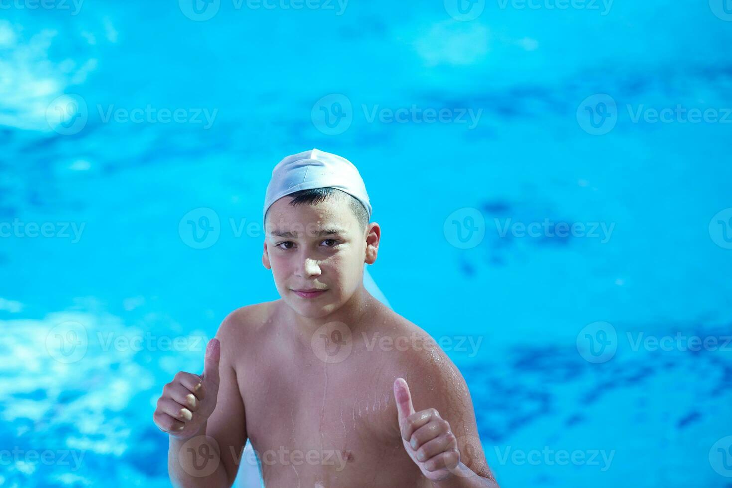 child on swimming poo photo